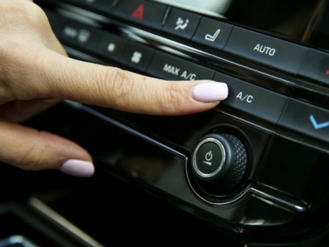 turning-turning-off-air-conditioner-car-close-up-scaled-1100x619